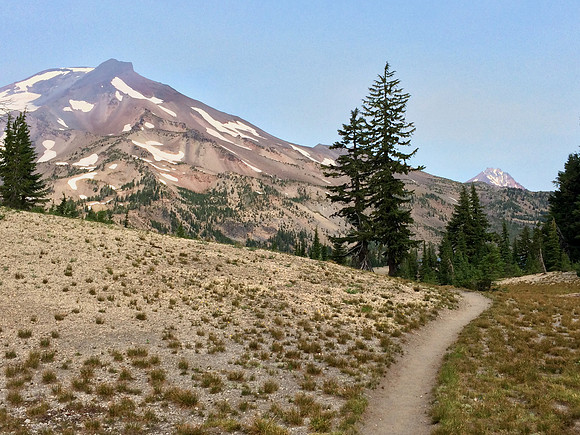 A slightly smoky view of the Sisters approaching Green Lakes